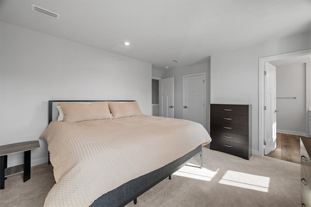 bedroom with light hardwood / wood-style flooring