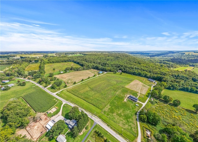 birds eye view of property featuring a rural view