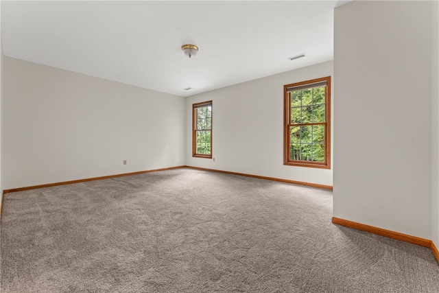 spare room with carpet flooring