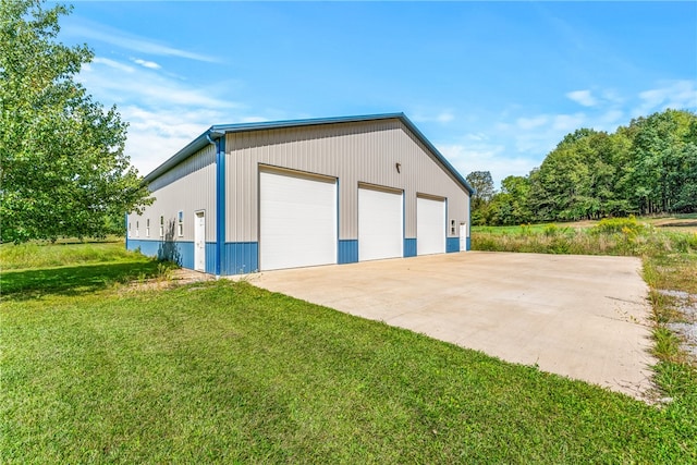 garage featuring a yard