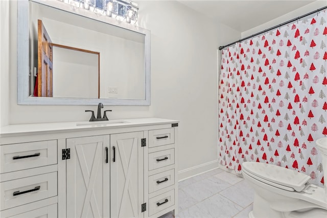 bathroom with vanity, toilet, and a shower with shower curtain