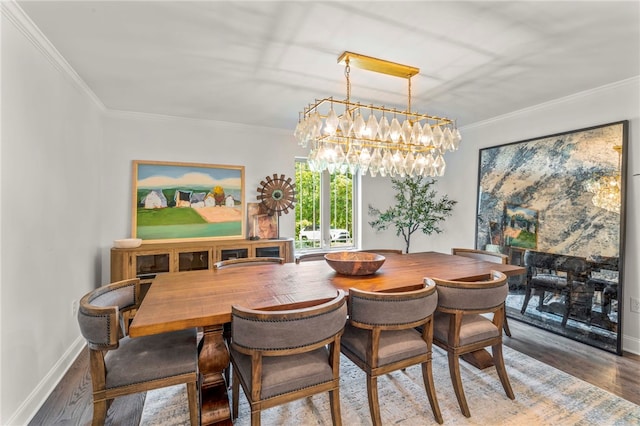 dining room with ornamental molding, dark wood-type flooring, and a notable chandelier