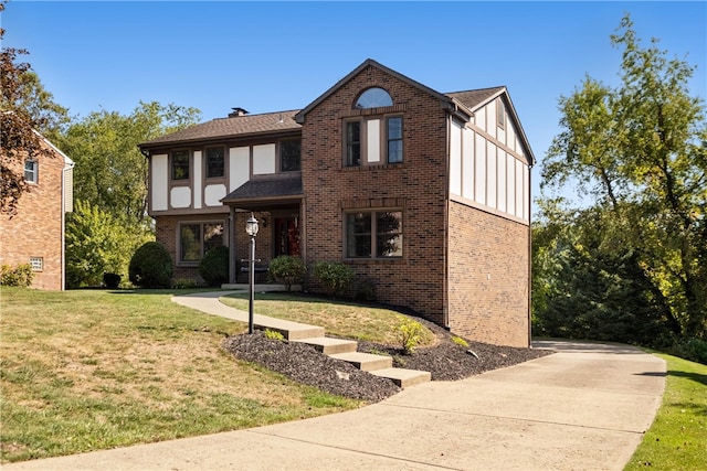 view of front of home featuring a front lawn