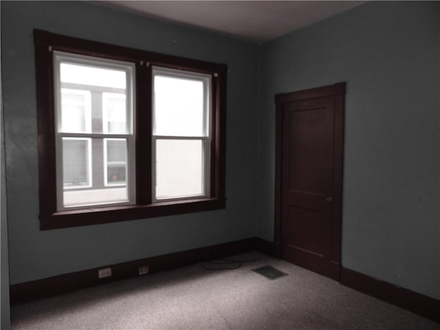 view of carpeted spare room