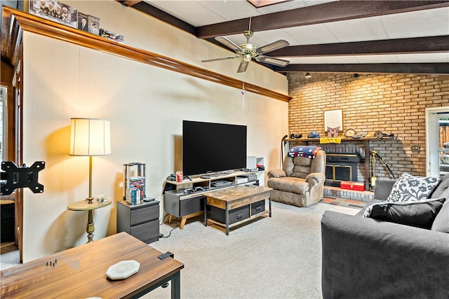 living room featuring carpet, ceiling fan, a brick fireplace, and lofted ceiling with beams