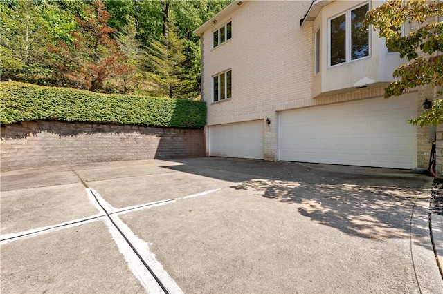 exterior space with a garage