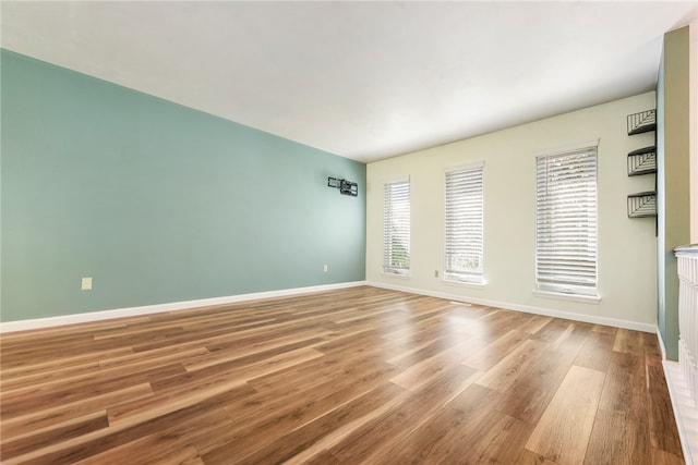 empty room featuring hardwood / wood-style floors