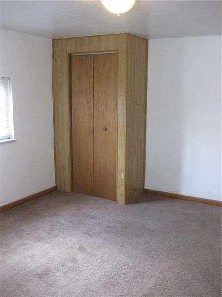 2608 Highland Ave, Mckeesport, PA 15132 - unfurnished bedroom with a closet and carpet floors