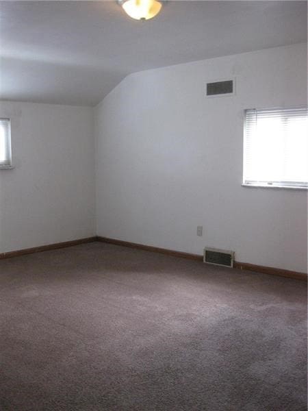 2608 Highland Ave, Mckeesport, PA 15132 - carpeted empty room with baseboards