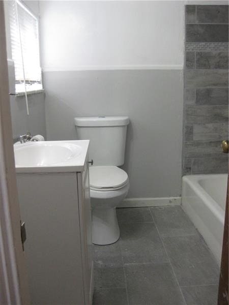 2608 Highland Ave, Mckeesport, PA 15132 - full bathroom with vanity, toilet, tile patterned flooring, and tub / shower combination