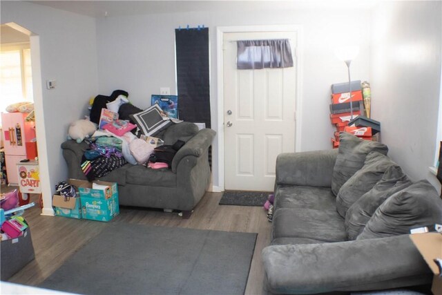2608 Highland Ave, Mckeesport, PA 15132 - living room with wood finished floors and arched walkways