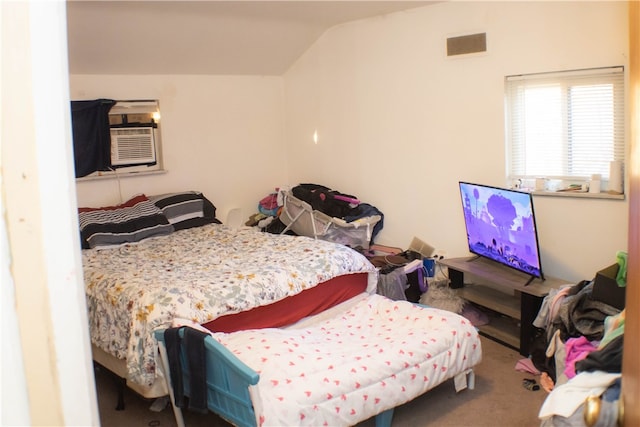 bedroom with carpet and vaulted ceiling