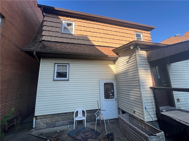 rear view of house featuring a patio