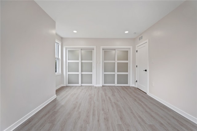 empty room featuring light hardwood / wood-style floors