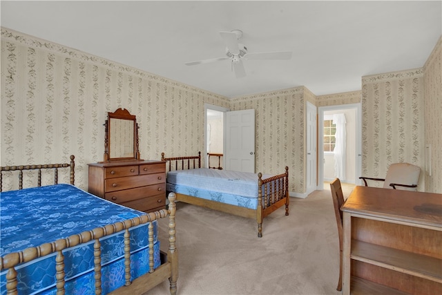 bedroom featuring ceiling fan and carpet floors