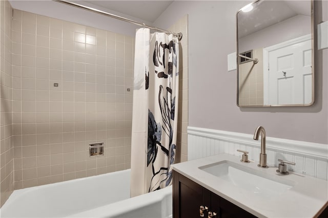 bathroom featuring vanity and shower / tub combo