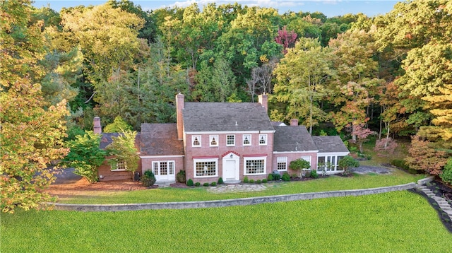 exterior space with a front yard