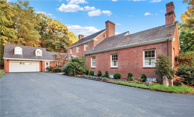 view of home's exterior with a garage