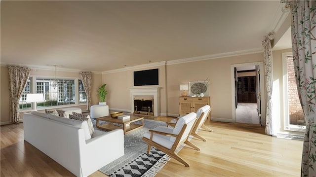 living room featuring hardwood / wood-style floors, a wealth of natural light, and crown molding