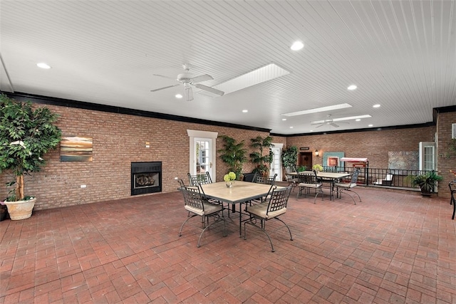 view of patio featuring ceiling fan