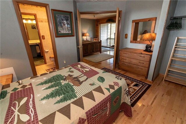B43AB Stoneridge Dr, Seven Springs Resort, PA 15622 - bedroom featuring light wood-style flooring and ensuite bath