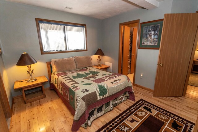 bedroom featuring light wood-type flooring