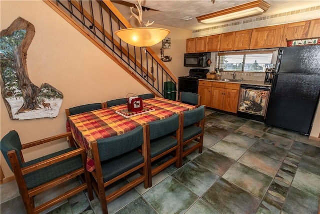 B43AB Stoneridge Dr, Seven Springs Resort, PA 15622 - dining area featuring stairs and dark stone finish floors