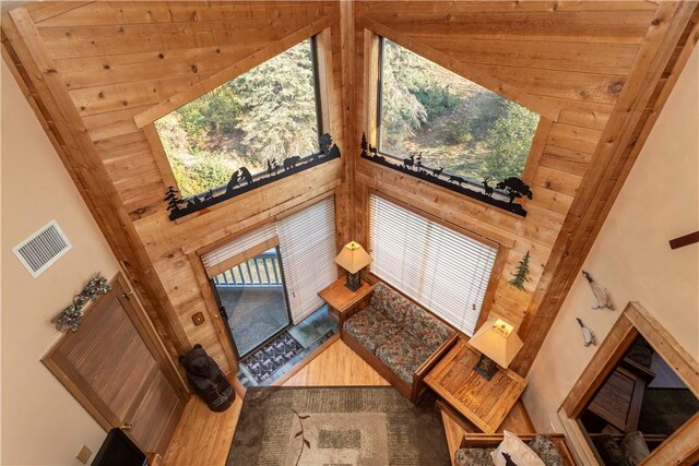 B43AB Stoneridge Dr, Seven Springs Resort, PA 15622 - living room featuring wood walls and a high ceiling