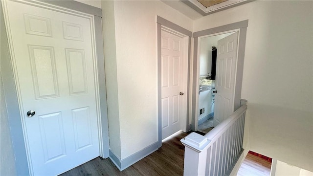 858 Monteiro St, Greenfield, PA 15217 - corridor featuring dark wood finished floors, baseboards, and an upstairs landing