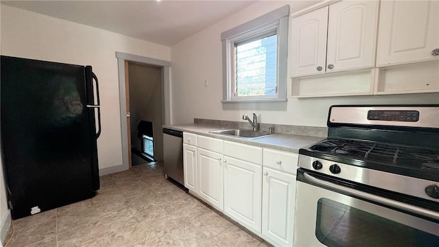 858 Monteiro St, Greenfield, PA 15217 - kitchen with stainless steel appliances, a sink, white cabinetry, and baseboards