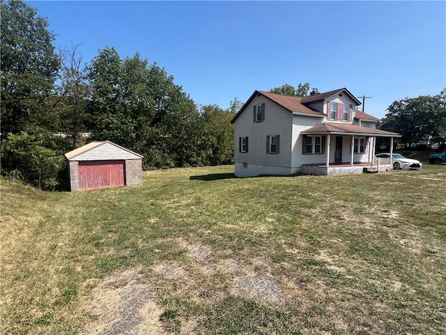 view of yard featuring a shed and a porch