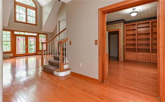 interior space with light hardwood / wood-style flooring and a wealth of natural light