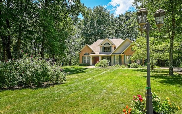 view of front of home with a front lawn