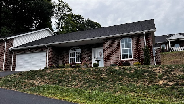 ranch-style home with a garage