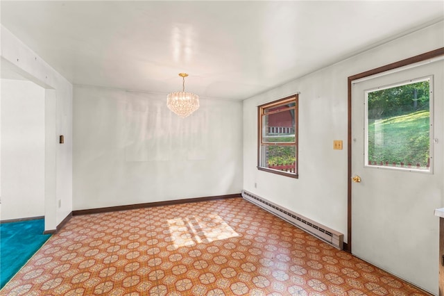 unfurnished room with a baseboard heating unit and a chandelier