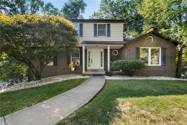 view of front property featuring a front lawn