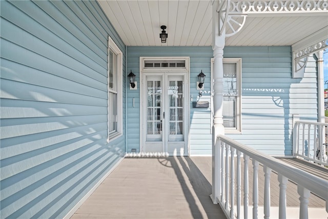 property entrance featuring covered porch