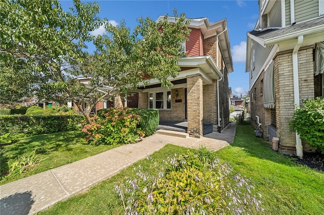 view of front of house with a front lawn