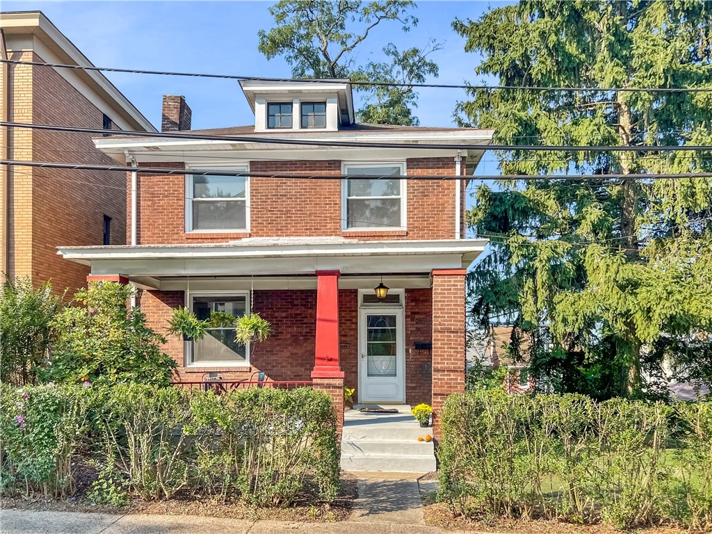 view of front of house featuring covered porch