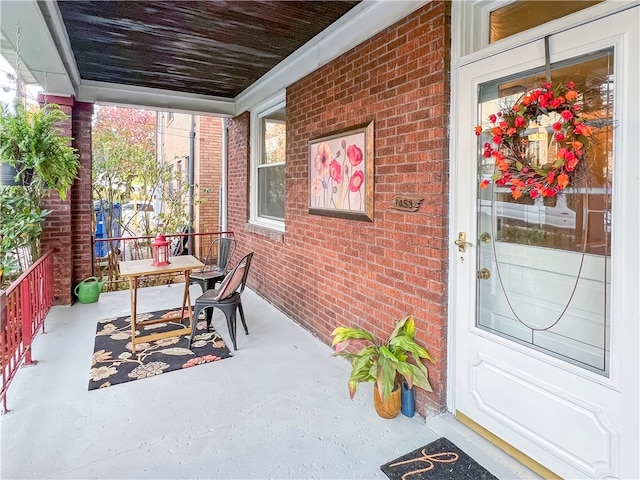 view of patio featuring a porch