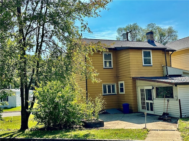 rear view of property with a patio