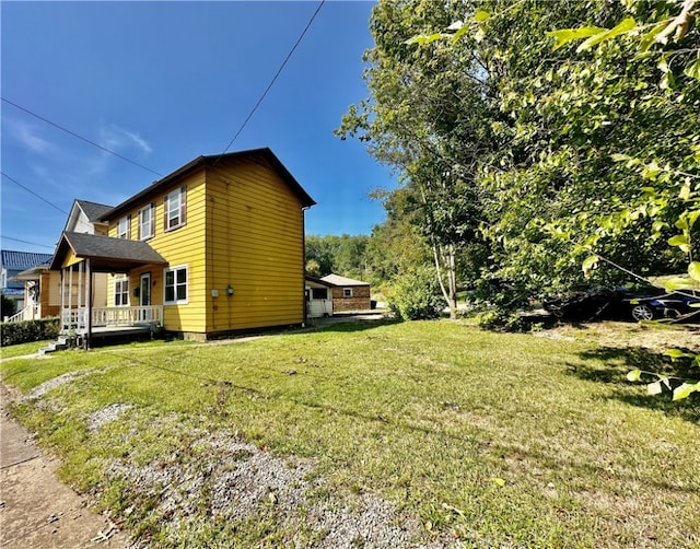 view of home's exterior with a lawn