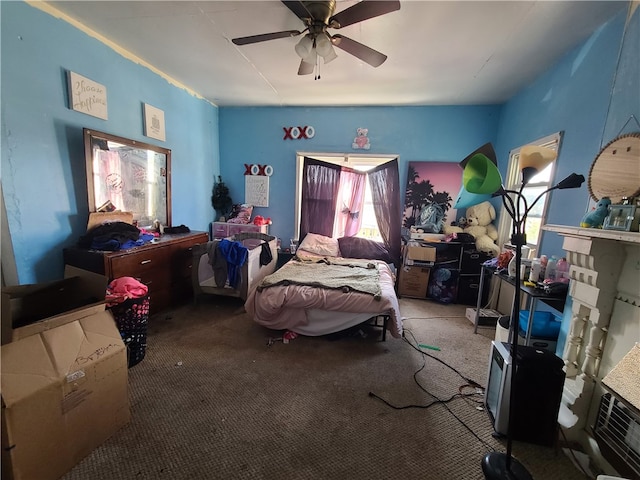 carpeted bedroom with multiple windows and ceiling fan