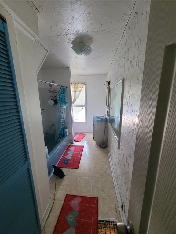 bathroom featuring shower / bath combination