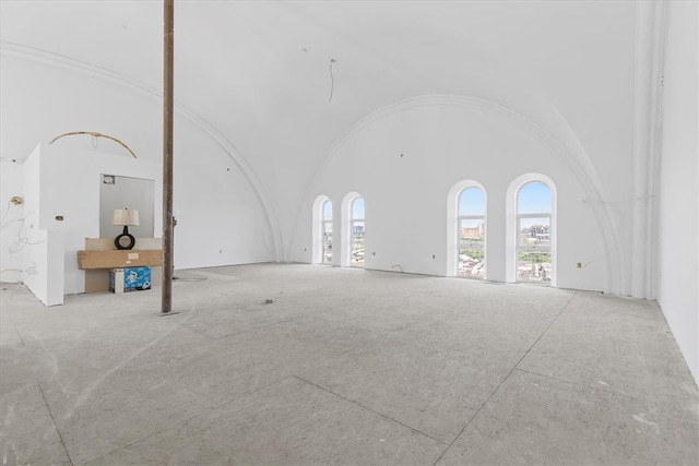 spare room featuring a high ceiling