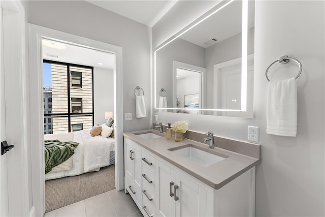 bathroom featuring vanity and tile patterned flooring