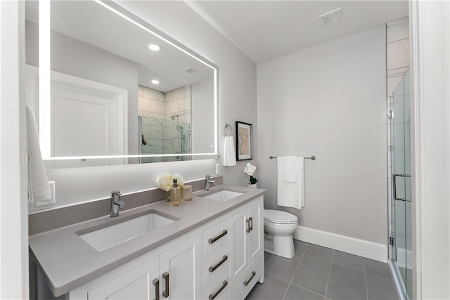 bathroom with vanity, toilet, an enclosed shower, and tile patterned flooring