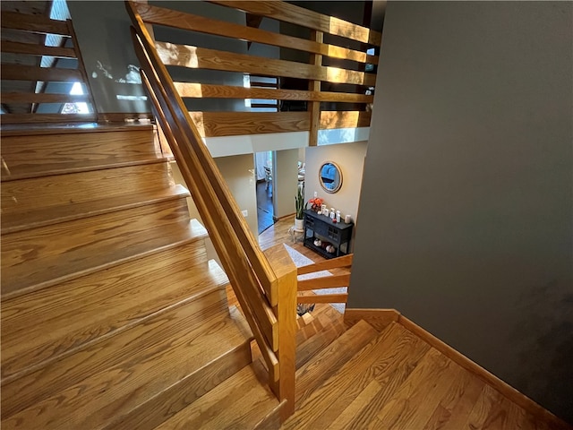 stairway with wood-type flooring