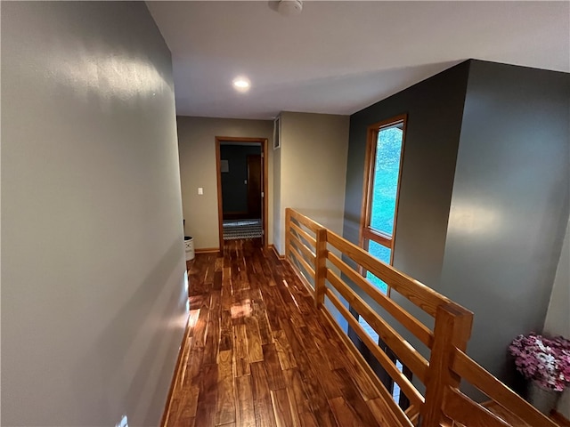 hallway featuring dark hardwood / wood-style flooring