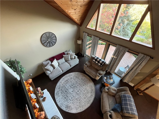 living room with high vaulted ceiling and wooden ceiling